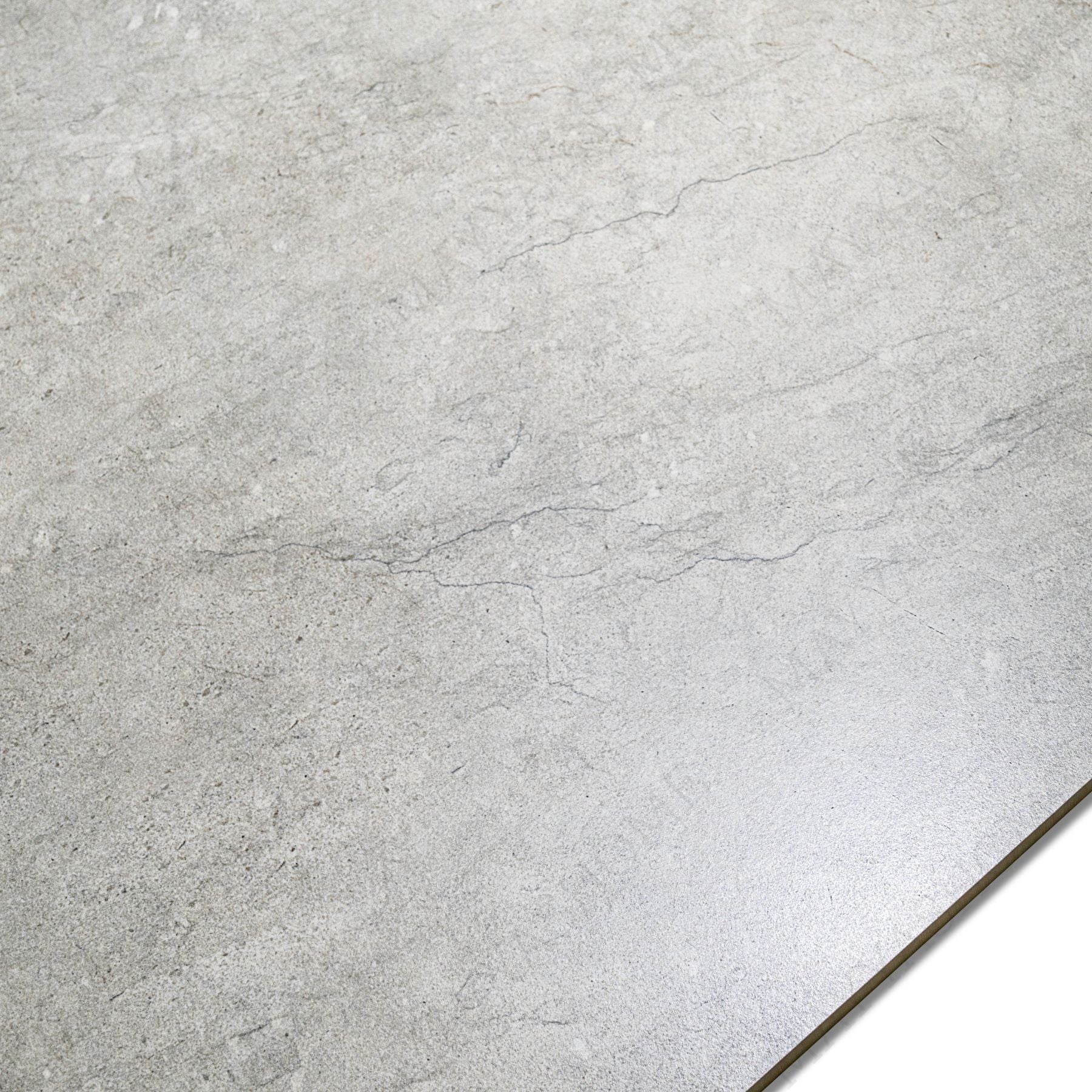 Raxsnow porcelain tile 60×120cm features a soft white stone finish with durable porcelain strength, ideal for elegant floors and walls.