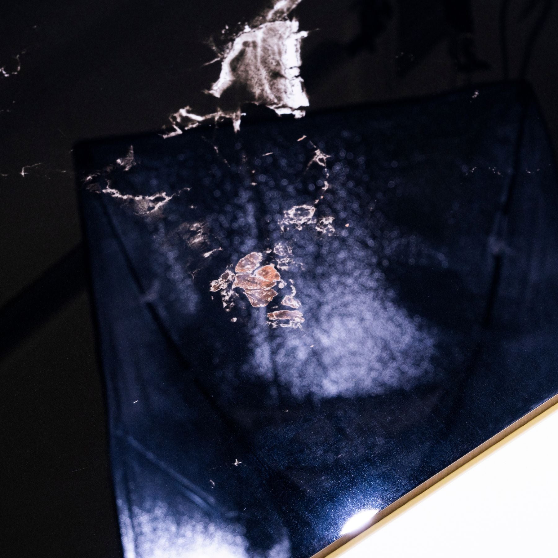 Roxy Black glossy marble effect porcelain tile 60x120cm with 9mm thickness features deep black base, soft grey veining and polished finish.