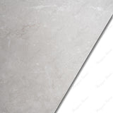 Shop LAIT PEARL porcelain tile 600x1200mm with 9MM thickness and rocker carving texture. Large format durable tile ideal for seamless floors and walls with excellent wear and stain resistance.