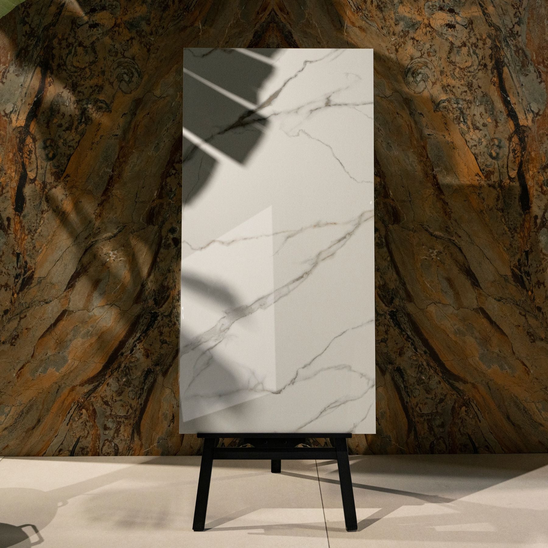 Statuario Austral glossy marble look porcelain tile 60x120cm with 9mm thickness offers bold veining, polished shine, and luxury appeal.