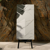 Statuario Austral glossy marble look porcelain tile 60x120cm with 9mm thickness offers bold veining, polished shine, and luxury appeal.