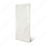 Statuario Ocean glossy marble effect porcelain tile 60x120cm with 9mm thickness features white base, soft grey veining, subtle ocean tones and polished finish.