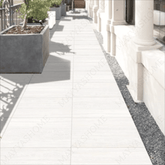 Travino Bianco 60x120cm porcelain tile, 20mm thick with R11 slip-resistant rough matt finish. Elegant white stone look, ideal for outdoor spaces.