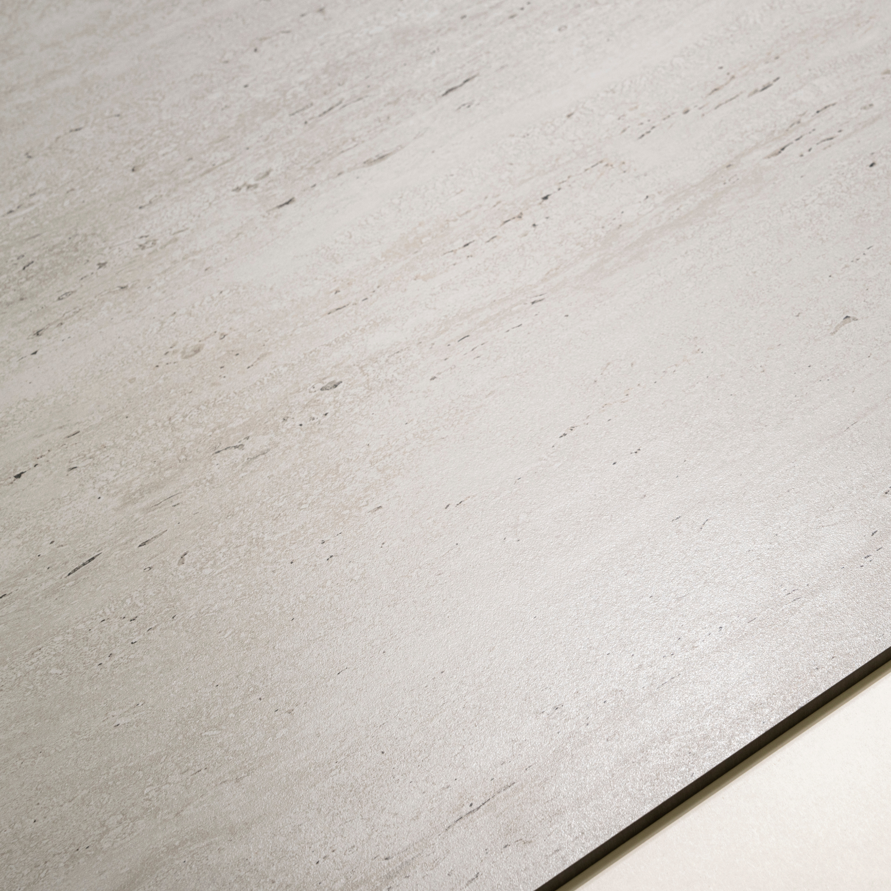 Travo Ash matte porcelain tile 60x120cm 9mm thickness, grey stone look design, durable porcelain tile for modern floors and walls.