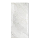 Wazti White glossy marble effect porcelain tile 60x120cm with 9mm thickness features bright white base, subtle veining and polished finish.