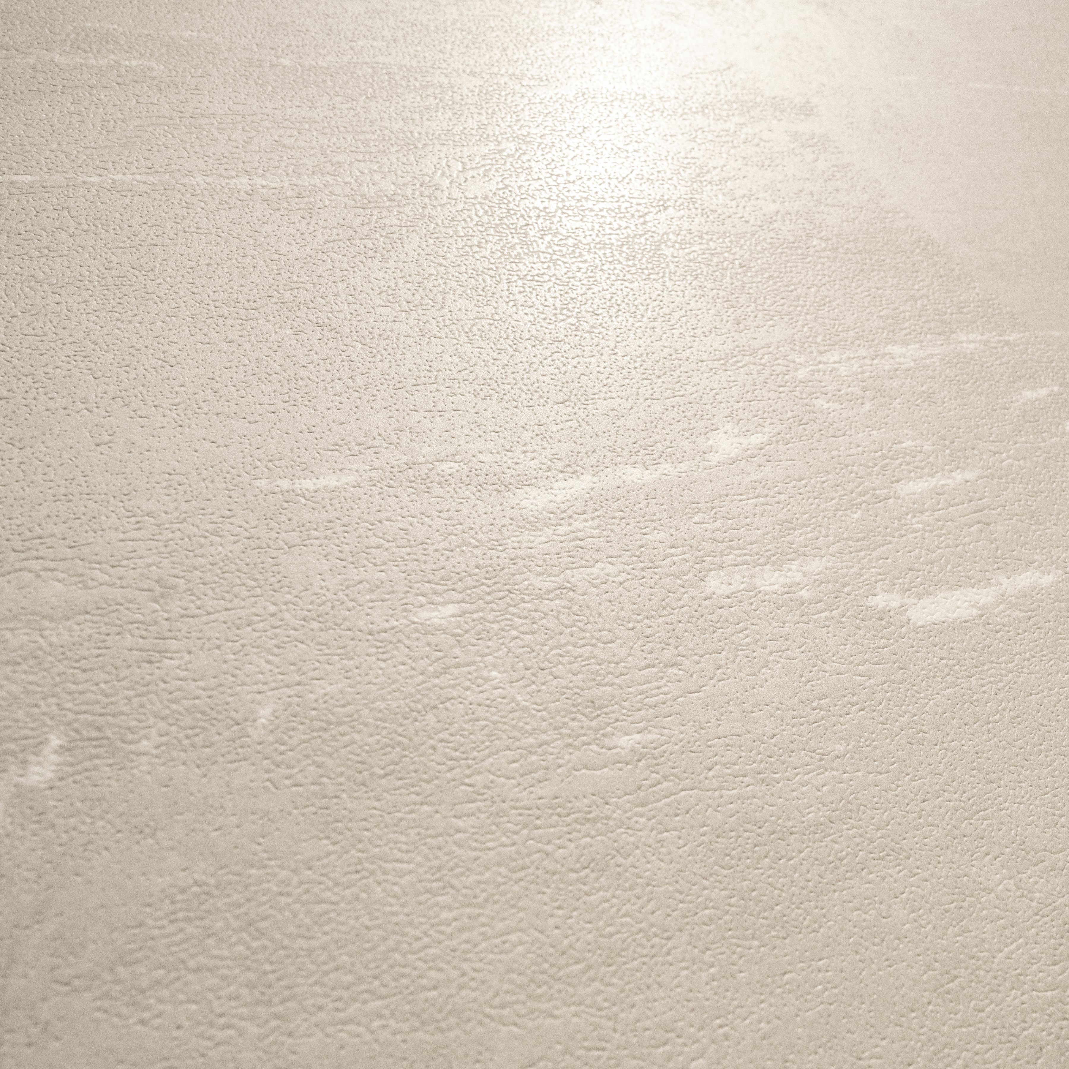 Element Cotano Dust large format porcelain slab angled view highlighting matte stone finish, soft cloudy movement, and rectified edges
