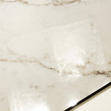 Close-up of Signora glossy porcelain tile showing mirror-polished marble surface with intricate gold vein clusters and 9mm thickness
