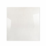 Elegant Crema glossy porcelain tile 120x120cm displayed on easel against luxury marble backdrop for UAE interior design