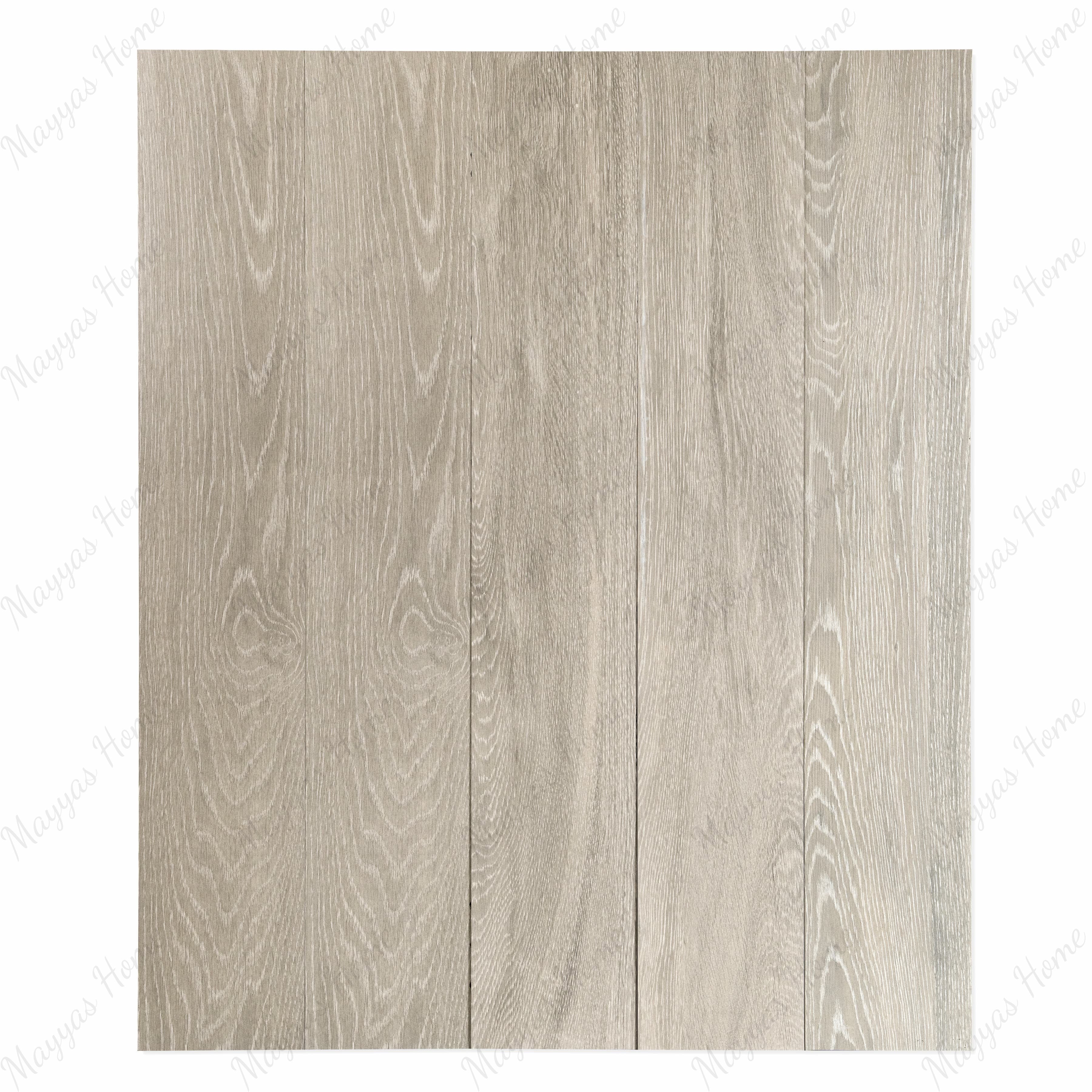 Vero White Ash wood-look porcelain plank tiles arranged in multi-plank layout showing natural oak grain pattern for UAE interior design