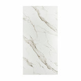 Calacatta Gold BM Matte porcelain slab displayed on easel against luxury backdrop showing white Calacatta marble with bold diagonal grey-gold veining for UAE interior design