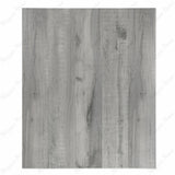 Arizon Grigio large format porcelain wood-look plank angled view highlighting matte finish, realistic distressed grey timber texture, and rectified edges