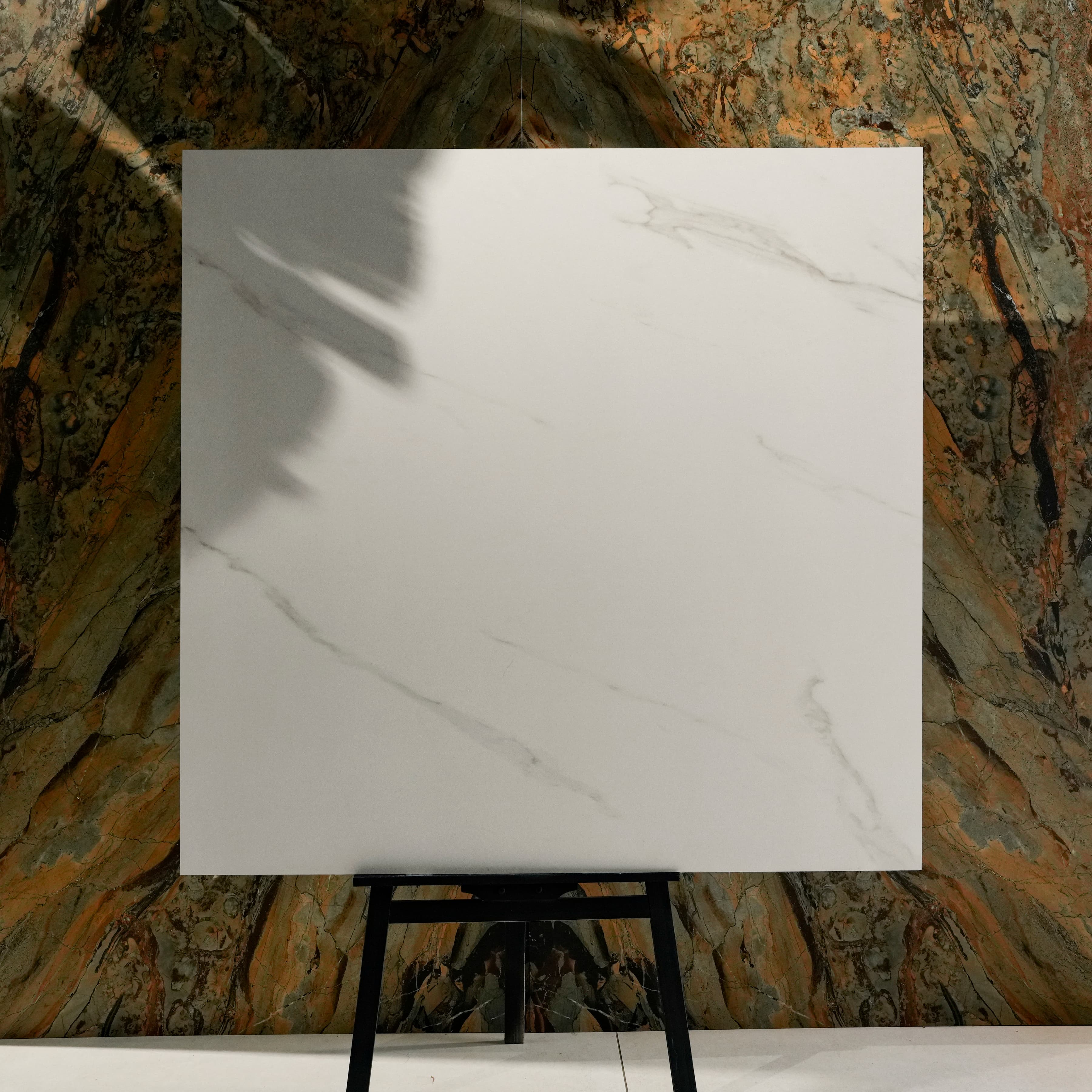 Smoke White 120x120cm matt porcelain tile with subtle grey veining. Durable, stylish, and perfect for modern floors and walls.