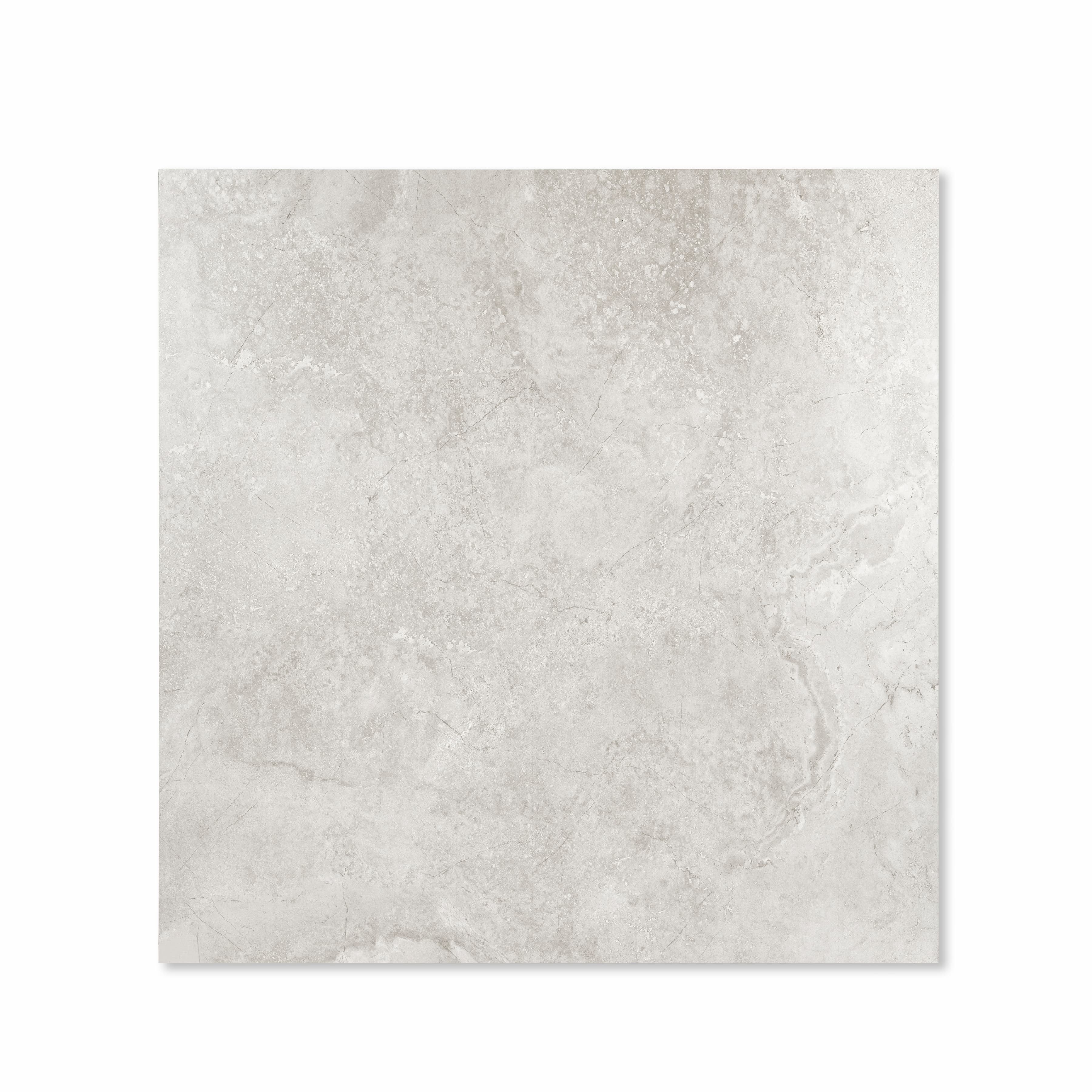 Resina Grey matte porcelain tile 120x120cm displayed on easel against luxury marble backdrop for UAE interior design