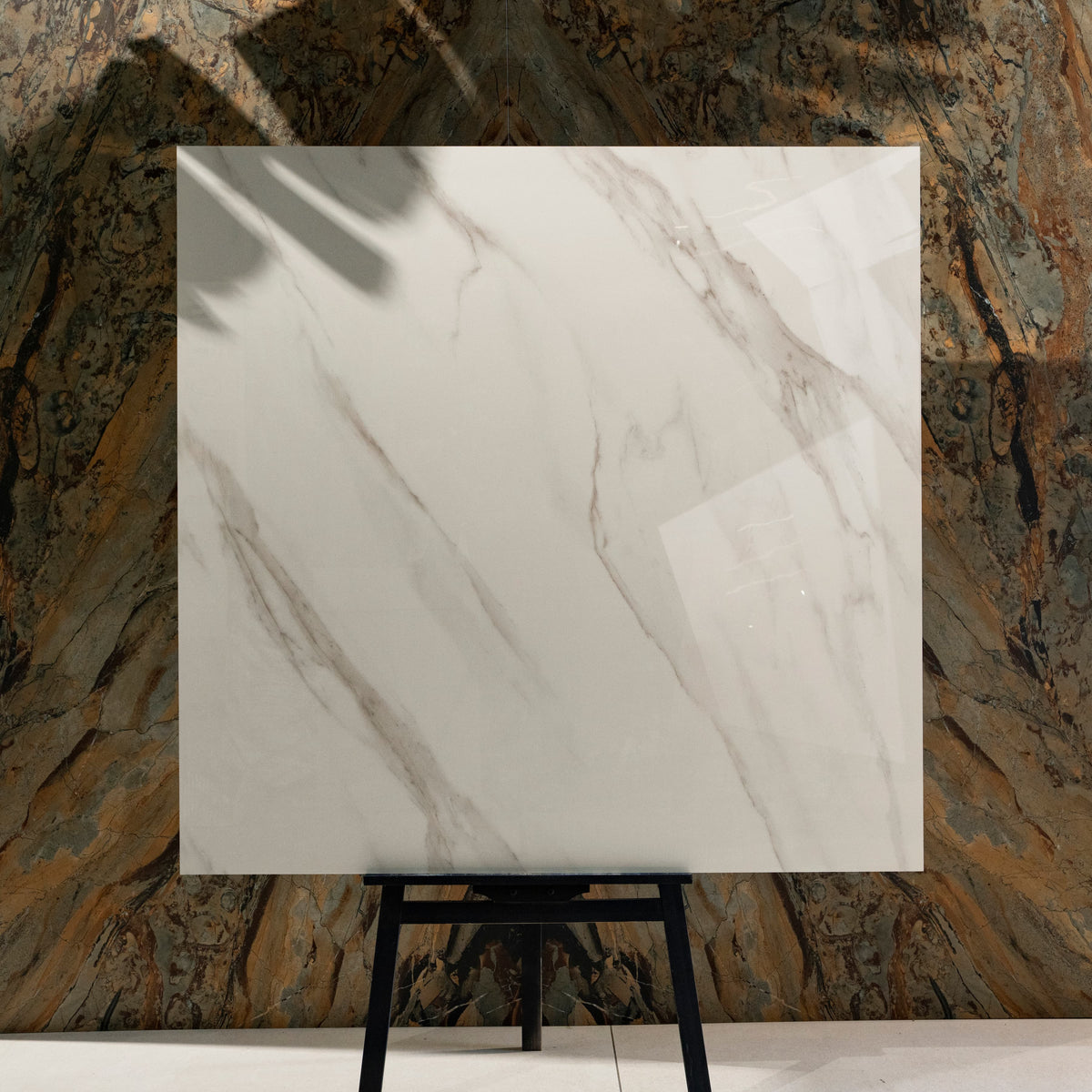 Shop STATUARIO ANGEL large format porcelain tiles (120x120cm) with a 9MM glossy finish and premium white marble effect. Durable, scratch-resistant, and easy to install. Perfect for luxurious interiors.