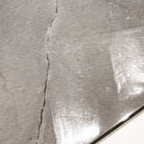 Close-up of Burberry Grey glossy porcelain tile showing mirror-polished marble surface with delicate black vein detail and 9mm thickness