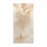 Bluette Onyx Red porcelain slab displayed on easel against luxury backdrop showing translucent cream onyx with warm amber swirls for UAE interior design