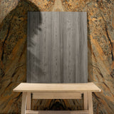 Close-up of Mosaici Natural wood-look porcelain plank showing detailed vertical pine grain, knot detail, and cool grey weathered tones