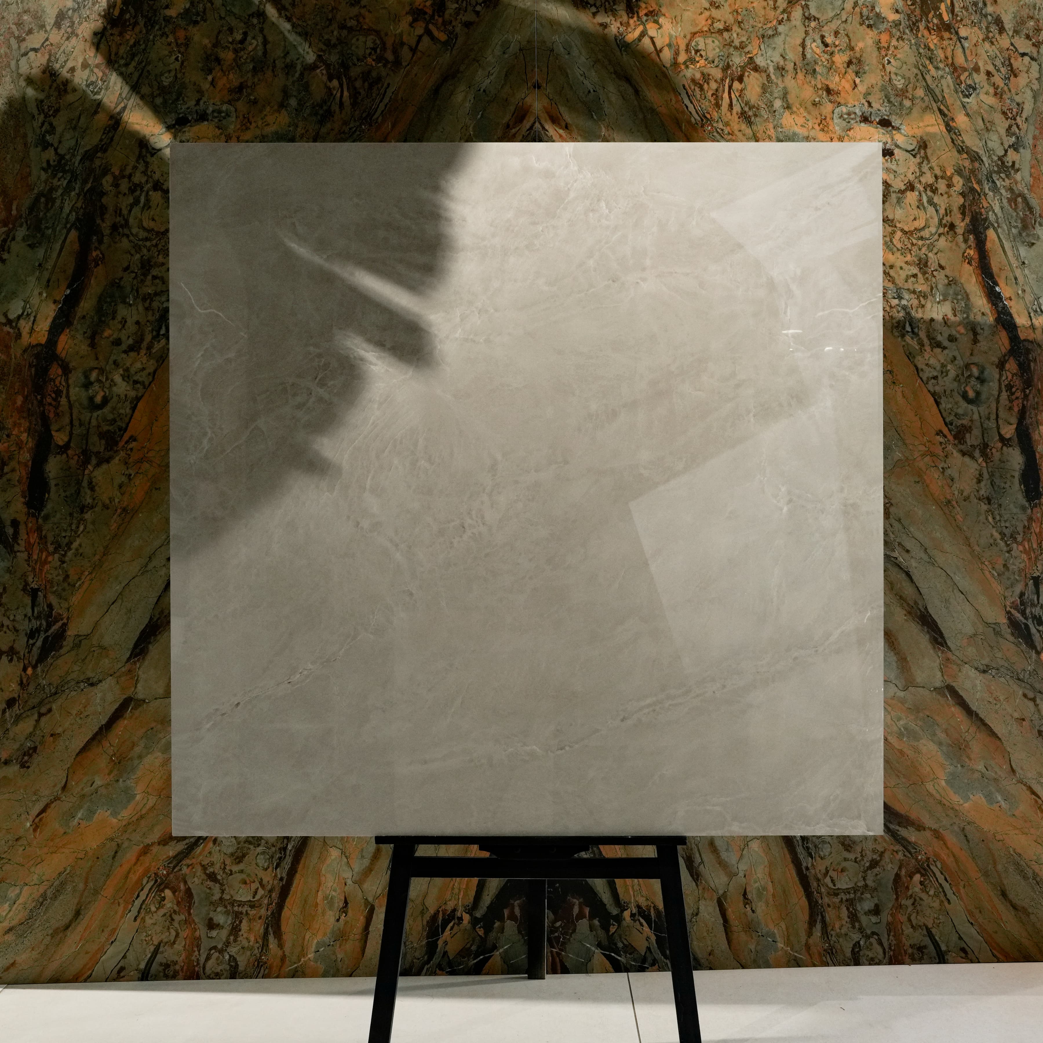 Royal Beige 120x120cm glossy porcelain tile flat view showing soft beige marble surface with cloudy tonal movement