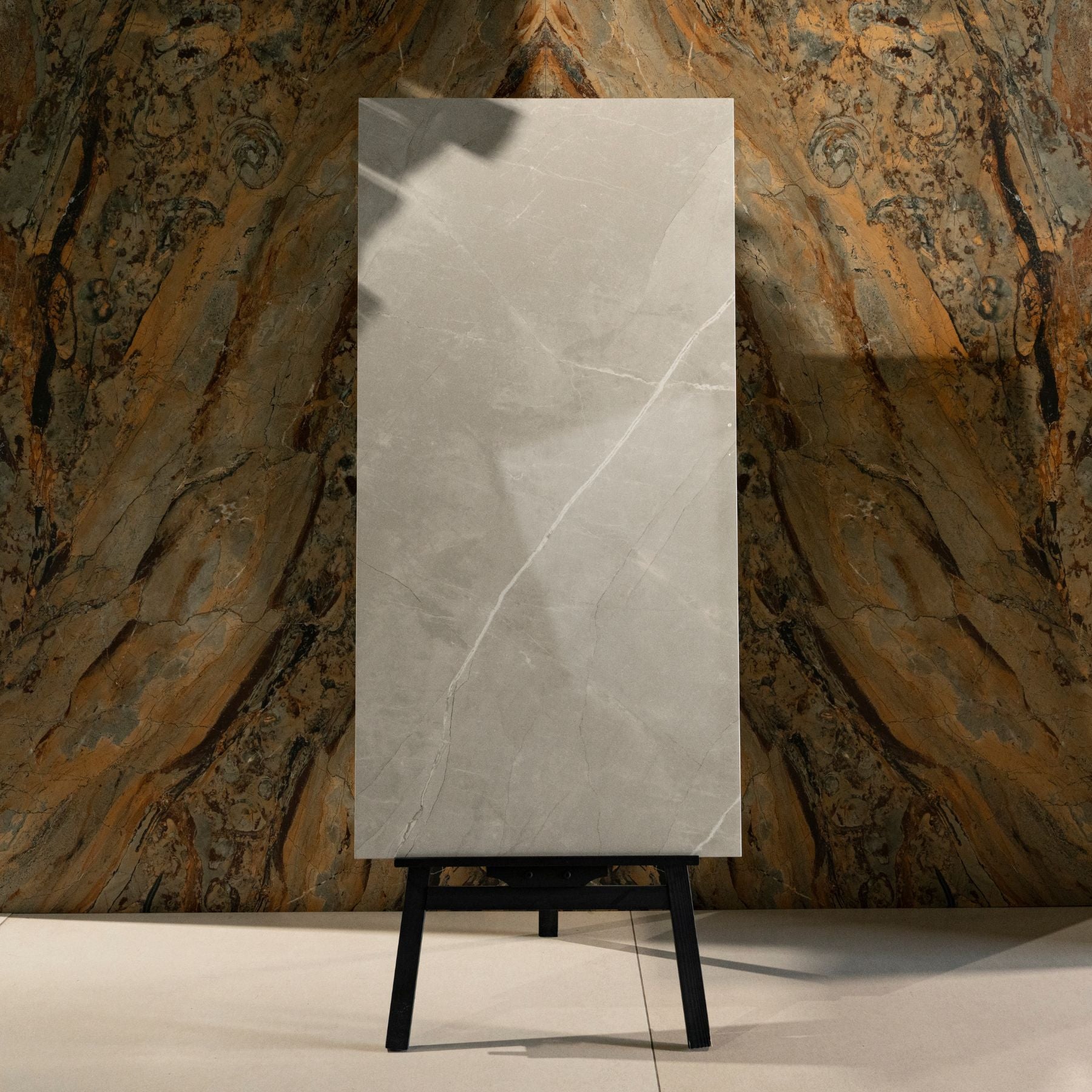 Armani Grey glossy marble effect porcelain tile 60x120cm with 9mm thickness features soft grey tones, elegant veining and polished finish for luxury interiors.