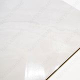 Artico Onyx Bianco glossy marble effect porcelain tile 60x120cm with 9mm thickness features white base, delicate veining, subtle onyx patterns & polished finish