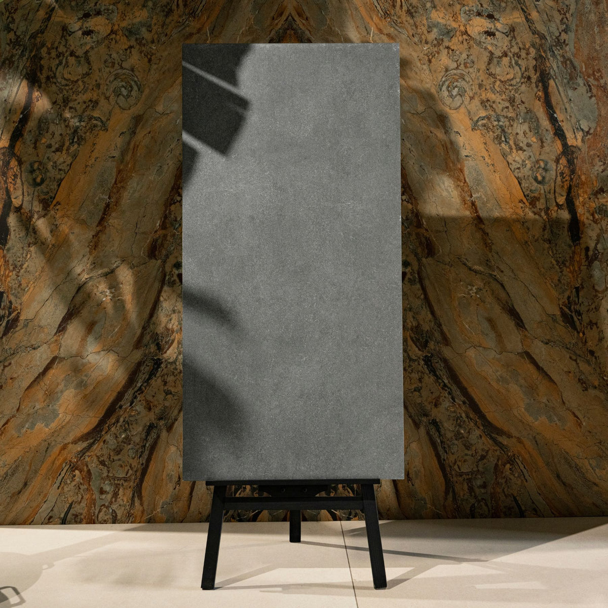 Cemento Nero porcelain tile in 60x120cm features a bold dark cement look with high durability, low maintenance, and modern appeal for floors and walls.