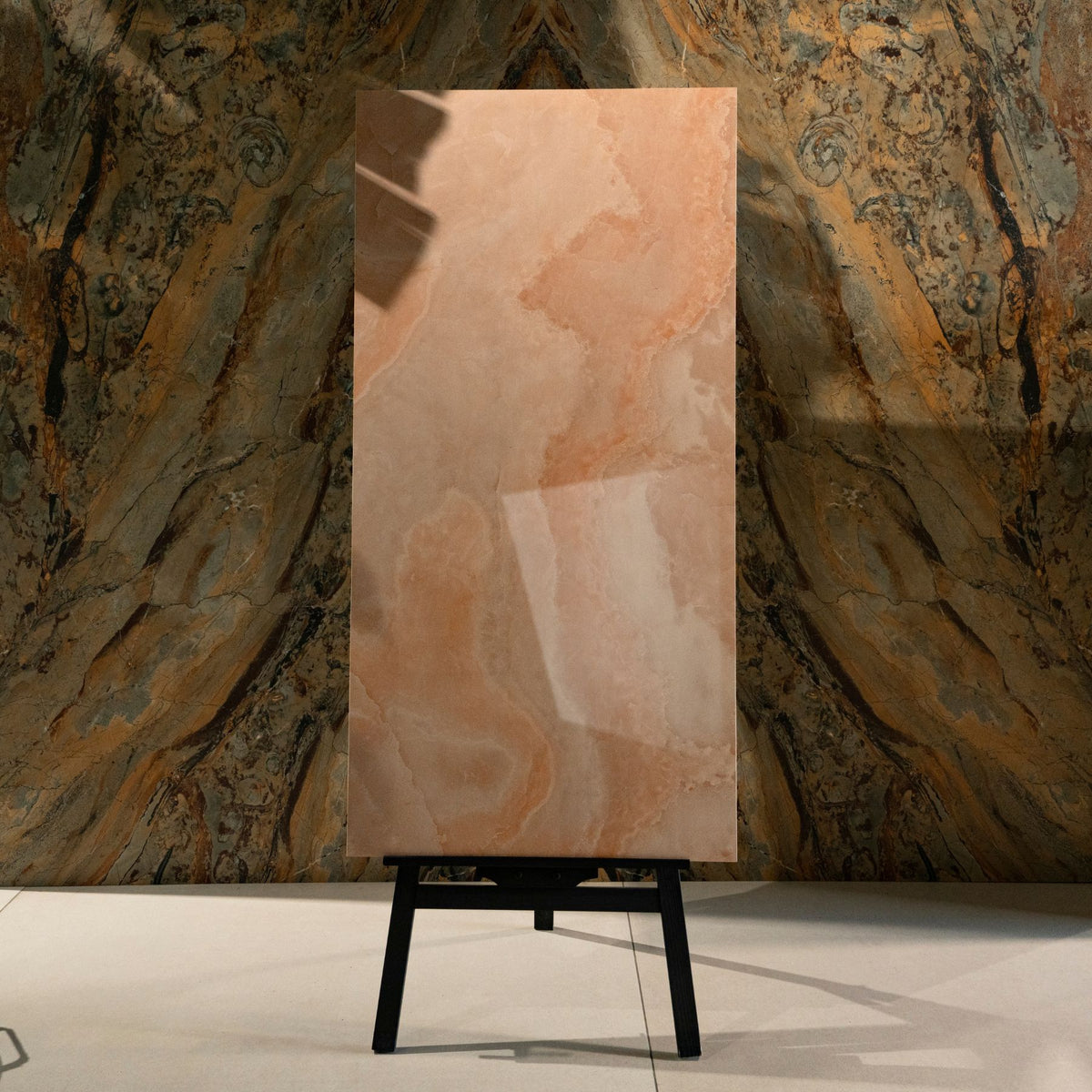 Coral Onyx glossy onyx effect porcelain tile 60x120cm with 9mm thickness features warm coral tones and polished luxury finish.