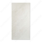 Fossil Ivory porcelain tile in 60x120cm size with classic stone look, soft ivory tones and durable 9mm thickness for walls and floors.