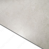 Fossil Ivory porcelain tile in 60x120cm size with classic stone look, soft ivory tones and durable 9mm thickness for walls and floors.