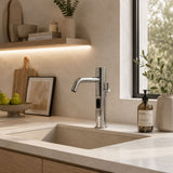Luxury battery-powered electronic washbasin mixer tap with extended body, above-counter installation and smart water-saving flow control.
