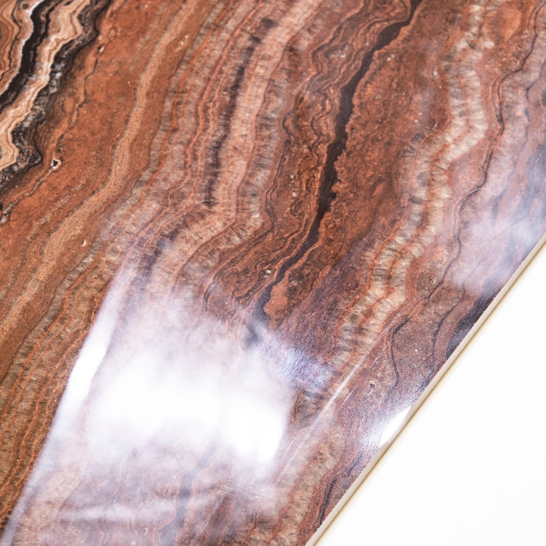 Mexican Onyx glossy onyx effect porcelain tile 60x120cm with 9mm thickness features warm amber tones and polished luxury finish.