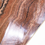 Mexican Onyx glossy onyx effect porcelain tile 60x120cm with 9mm thickness features warm amber tones and polished luxury finish.