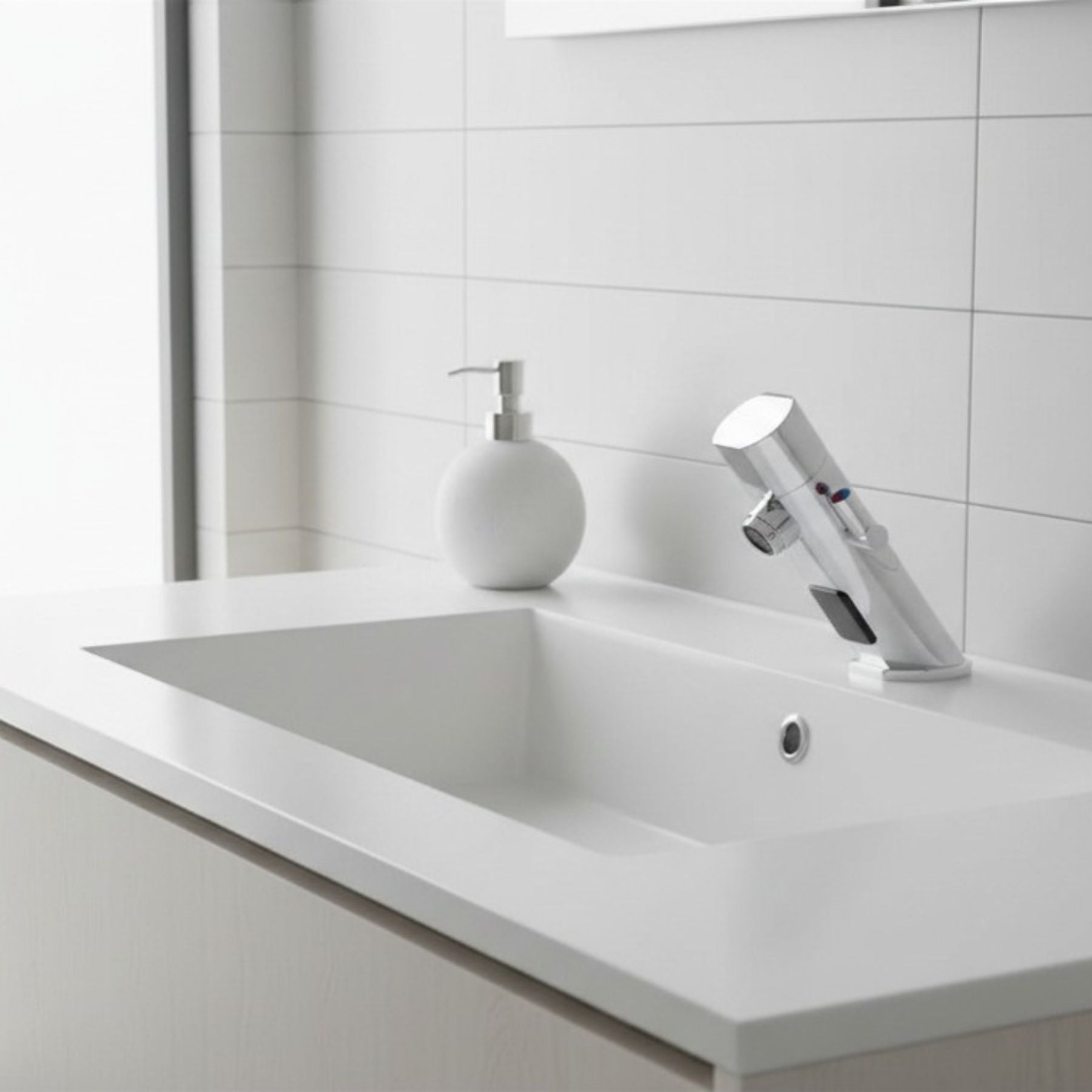 Premium battery-powered electronic basin mixer tap with above-counter installation, flexible hose connection and water-saving flow limiter technology.