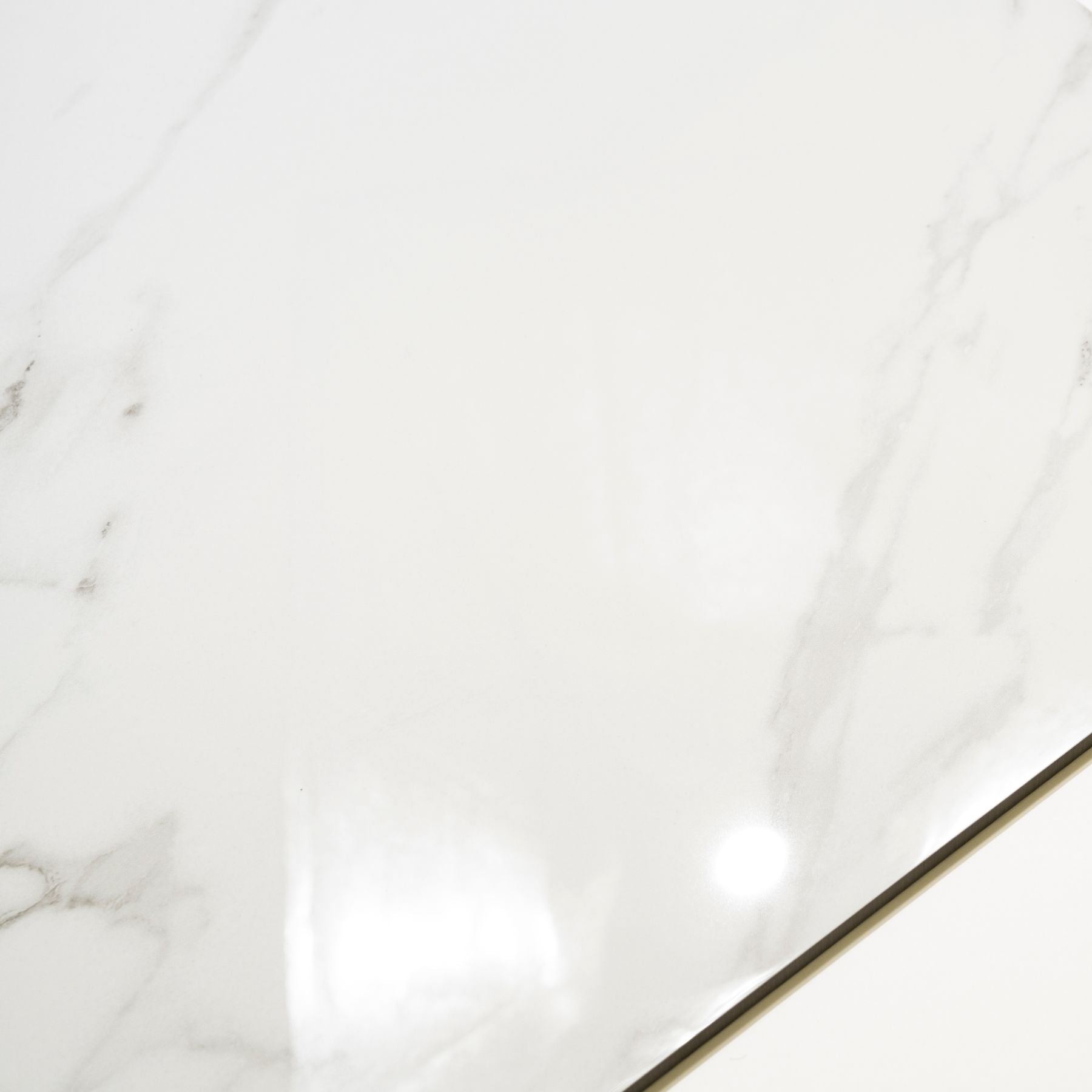 Statuario Classic glossy marble effect porcelain tile 60x120cm with 9mm thickness features white base, elegant grey veining and polished luxury finish.