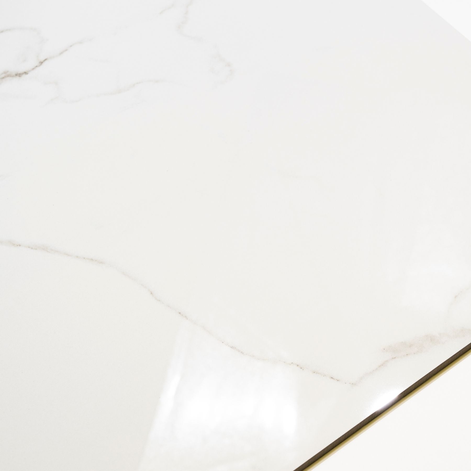 Statuario Ocean glossy marble effect porcelain tile 60x120cm with 9mm thickness features white base, soft grey veining, subtle ocean tones and polished finish.