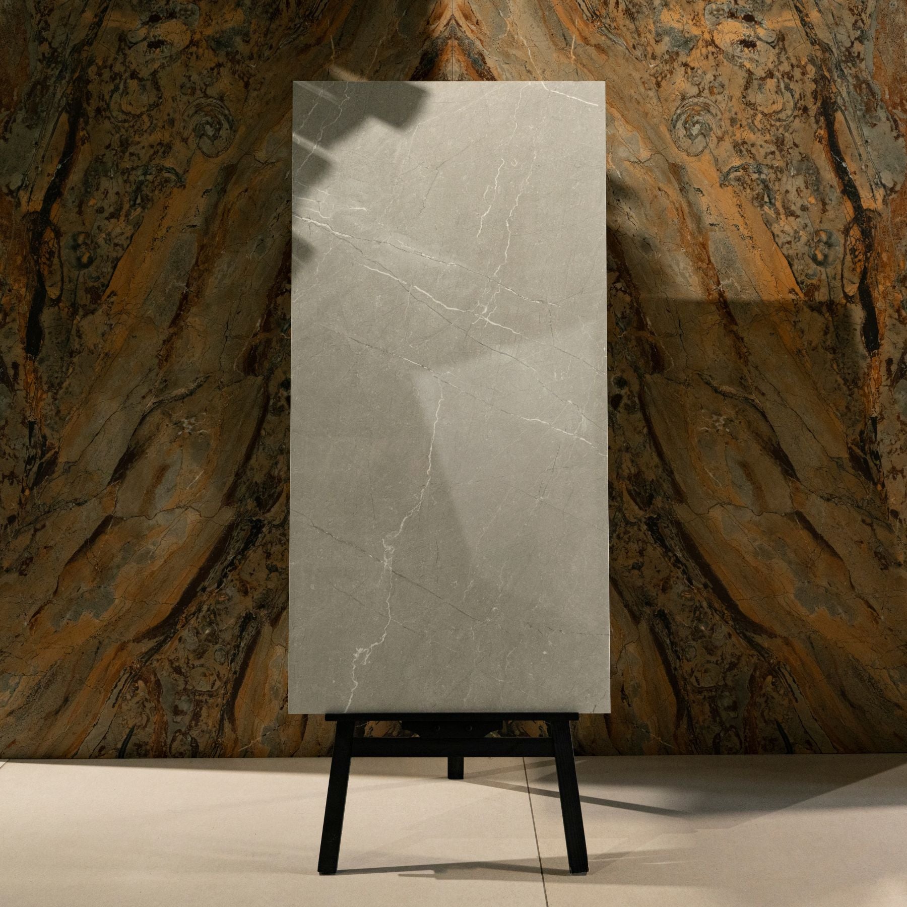 Toscana Grey glossy marble effect porcelain tile 60x120cm with 9mm thickness features soft grey tones, natural veining and polished finish.