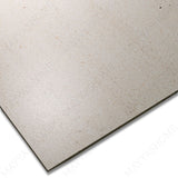 White Dune porcelain tile in 60x120cm size with soft sand effect, subtle white tones and durable 9mm thickness for walls and floors.